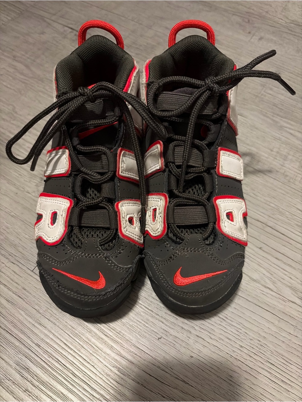 Nike Kids Black Sneakers with Red Accents